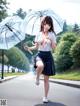 A woman walking down a street holding an umbrella.