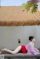 A woman in a pink kimono sitting on a wooden bench.