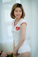 Ye Na hot beauty in nurse-style lingerie (9 photos)