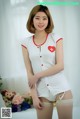 Ye Na hot beauty in nurse-style lingerie (9 photos) P8 No.4fd136
